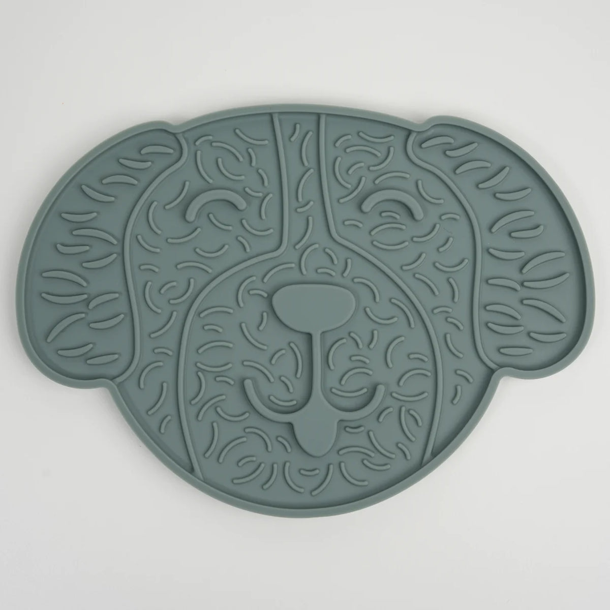 Moss green licking mat shaped like a dog's face