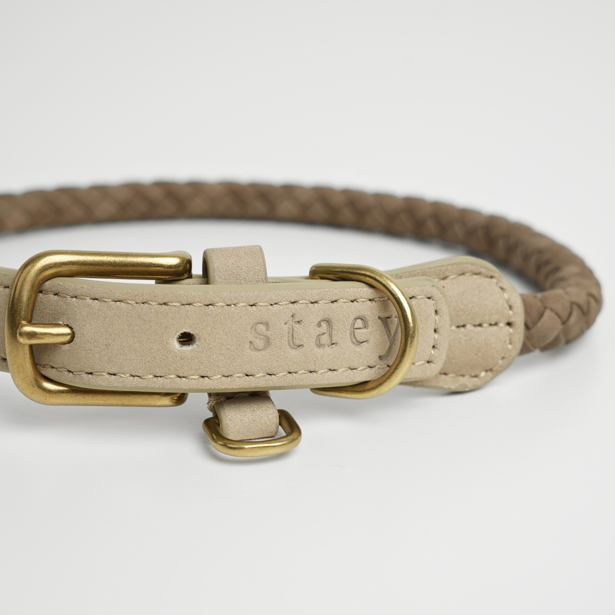 Taupe braided leather dog collar with a brass buckle and Staey stamp