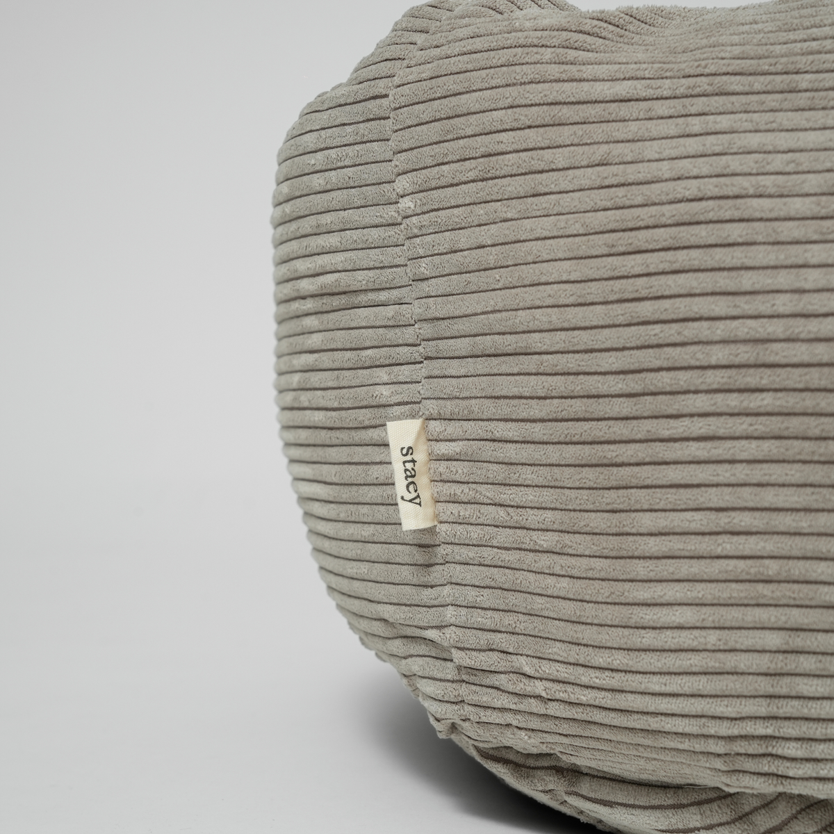Close-up of the Staey label on the dune corduroy dog bed